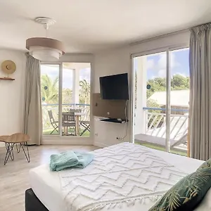 https://serenite.comcaribbean.com